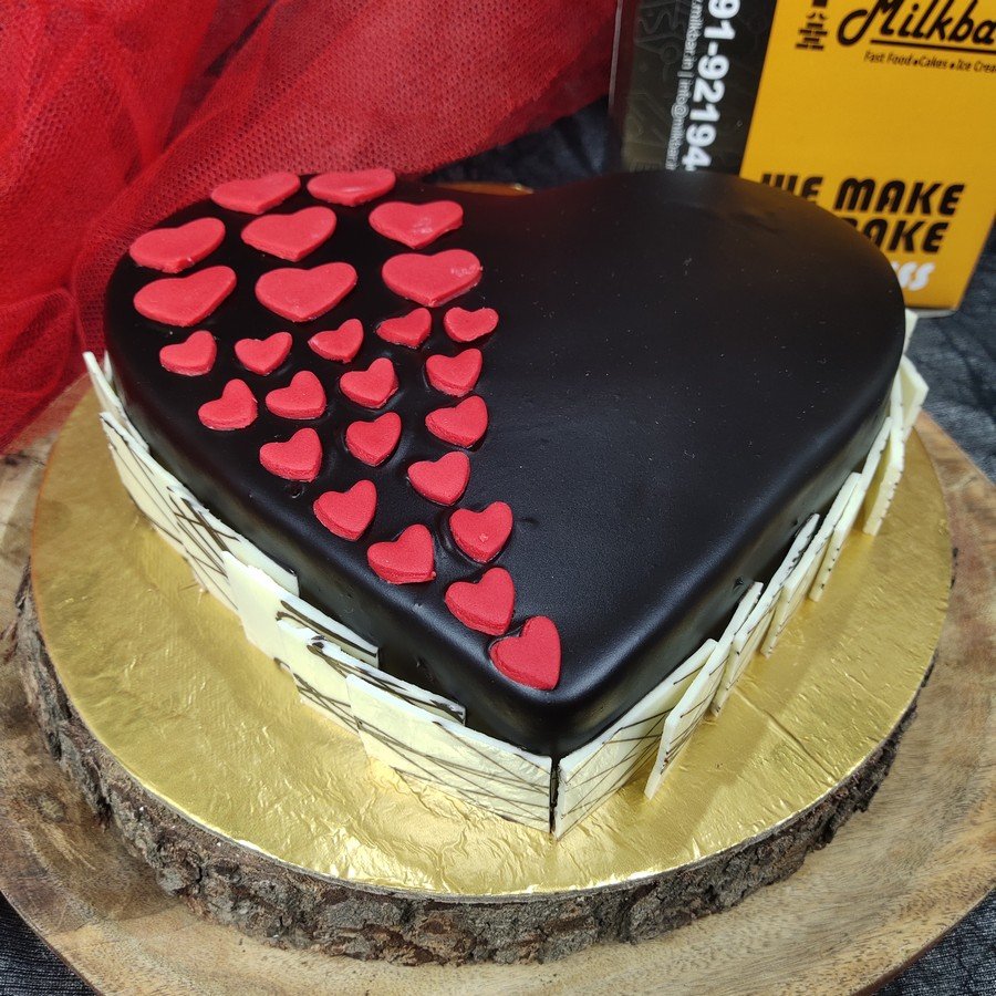 Sending exotic red roses n chocolate truffle cake in heart shape to Mumbai,  Same Day Delivery - MumbaiOnlineFlorists