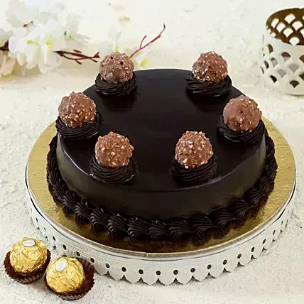Anniversary Truffle Cake (MB491) rich chocolate truffle cake topped with ferrero balls from best bakery cakes shop in Aligarh